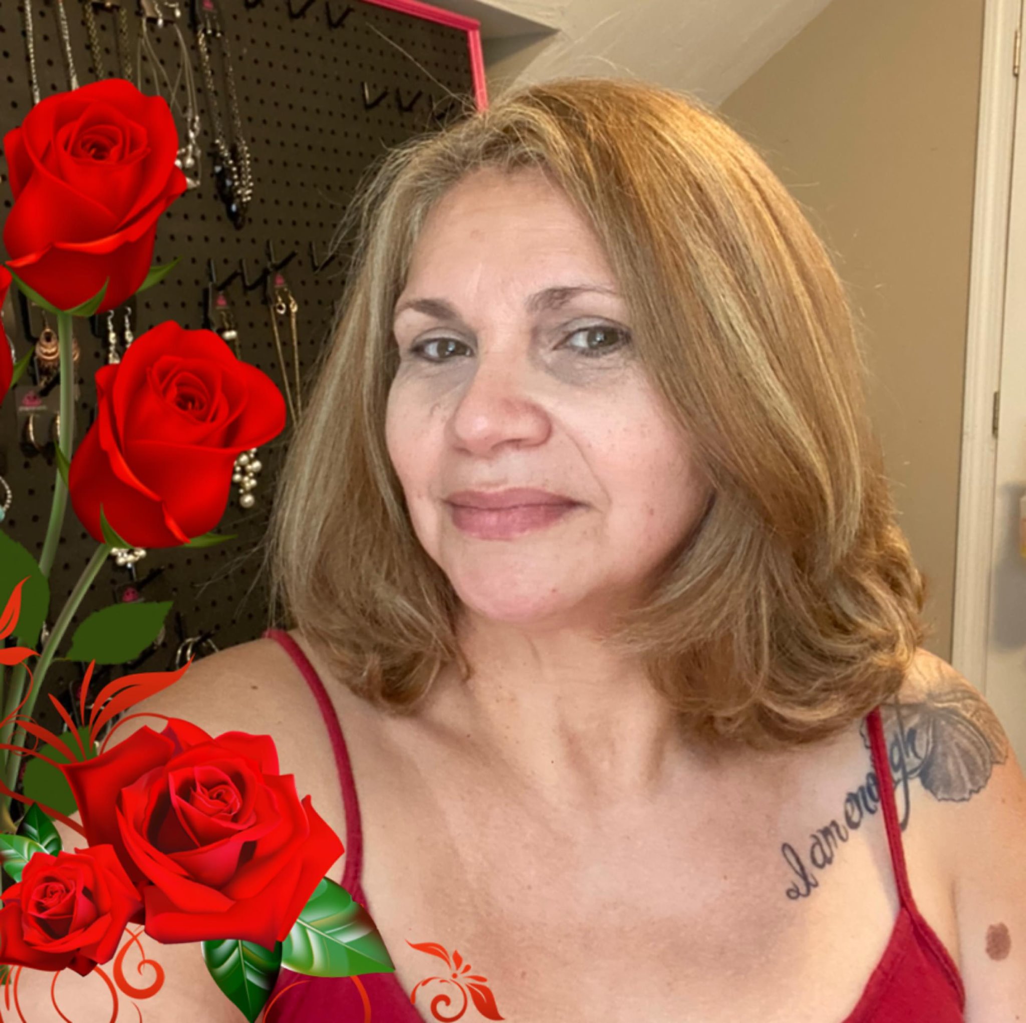 Portrait of Linda 'Lela' Santos, founder of Lela's Krafty Korner