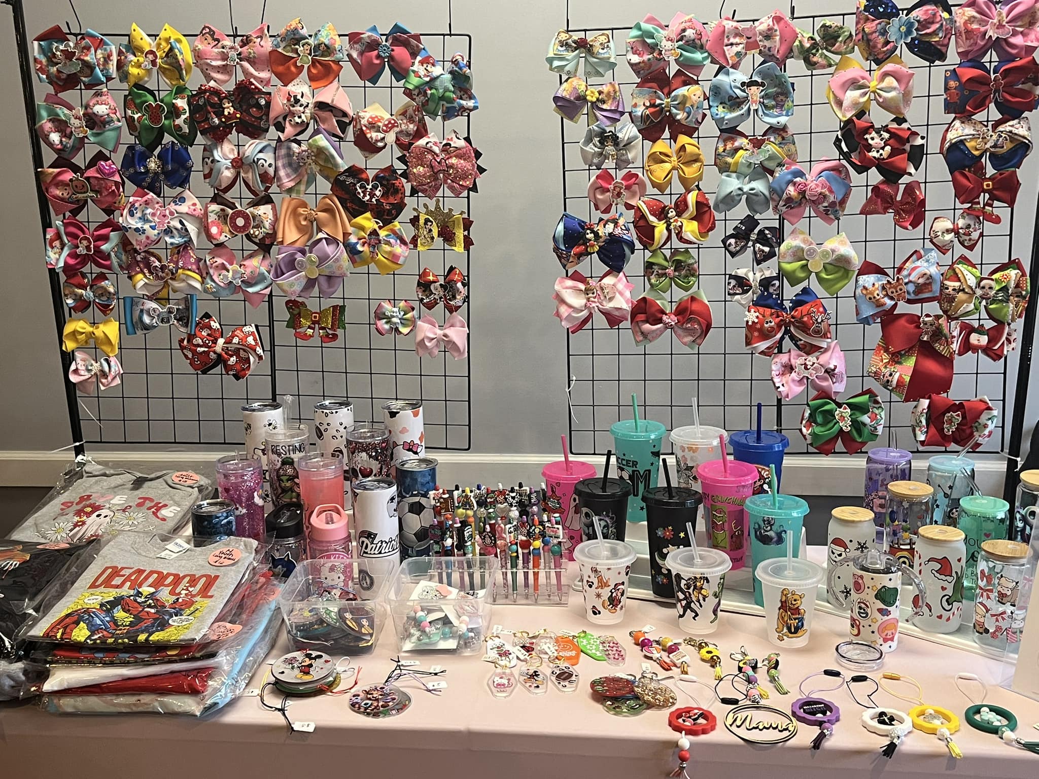 Lela's craft table with handmade accessories and supplies